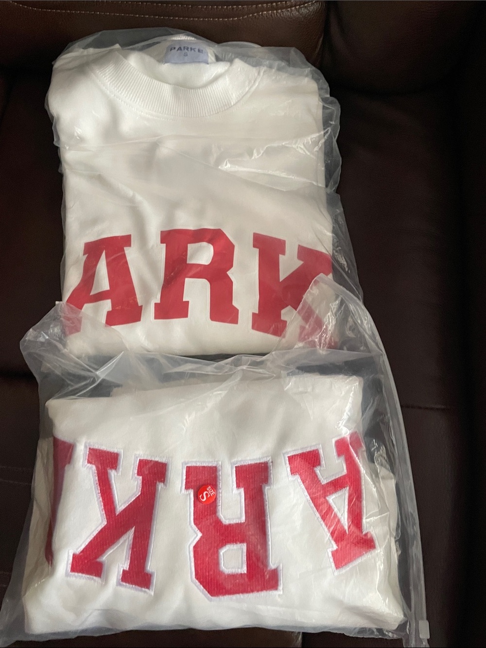 New cotton Sweatshirt white with Red  Logo size small